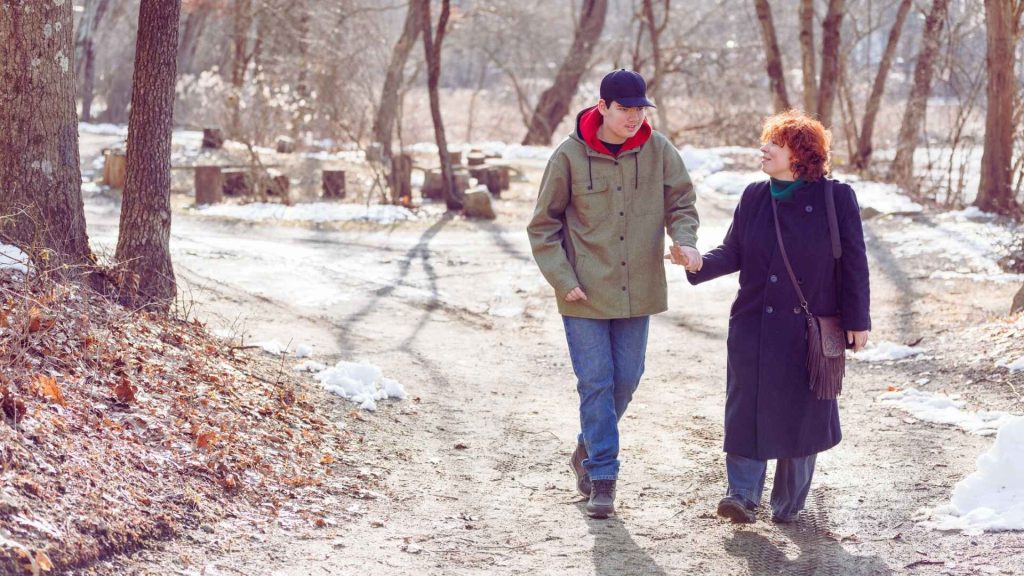 Mom and Son On A Happy Walk With Son in Addiction Recovery
