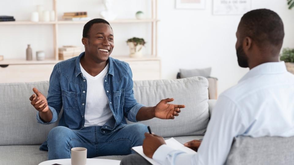 two men discuss, is binge drinking alcoholism